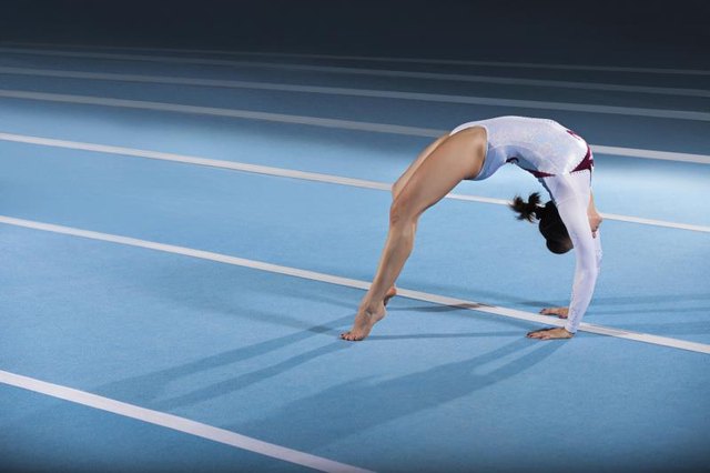 Gymnastics Drills For A Full Twist Layout Livestrongcom 