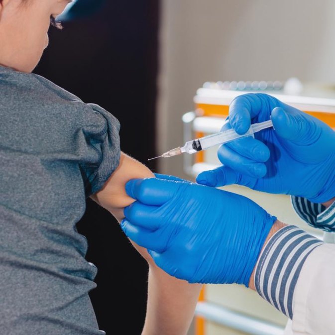 What are common reactions to the flu shot?