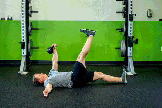 5. Supine Leg Lowering With Kettlebell