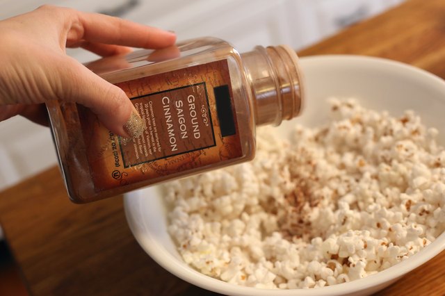 how to make seasoning stick to air popped popcorn