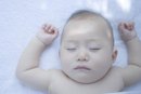 About Sleeping Wedges for Babies With Reflux | LIVESTRONG.COM