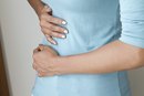 Causes of Left Side Abdominal Pain in Females | LIVESTRONG.COM